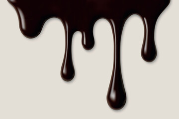 Dripping chocolate on light beige background
