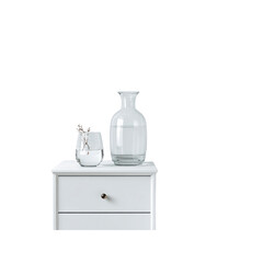 Serene Minimalist Bedroom Still Life Water Pitcher, Glass, and Dried Flowers on White Nightstand
