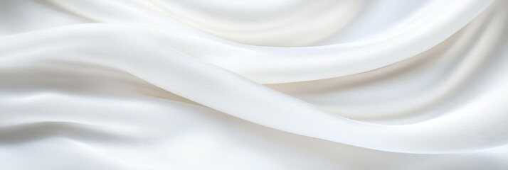 Naklejka premium Smooth flowing white fabric with soft folds and gentle curves creating a serene and elegant texture