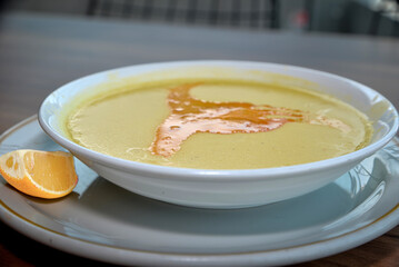 Lentil Soup plate on table in restaurant
