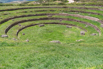 Scenic view with the circular agricultural terraces of Moray an Inca archaeological site in the Sacred Valley of Peru.