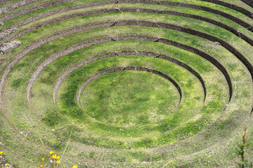 Scenic view with the circular agricultural terraces of Moray an Inca archaeological site in the Sacred Valley of Peru.
