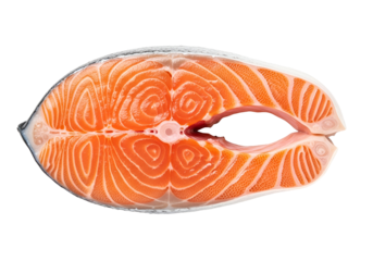 A vivid, close-up view of a fresh salmon fillet, showcasing its distinct, intricate, and vibrant orange-pink tones against a stark black backdrop.