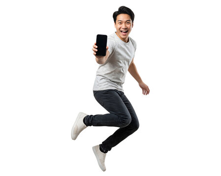 Asian man holding phone in hand jumping smiling with phone screen facing camera