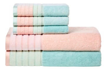 Stack of clean folded pastel pink and blue bathroom towels isolated with transparent background