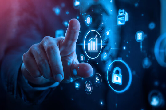 Businessman touching a holographic interface with a glowing business growth chart. A concept of Fintech, digital investment, stock market analysis, and financial technology.