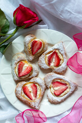 Romantic St Valentine’s Strawberry Heart Tarts with Red Rose, Pink Ribbon on White Muslin. Love.