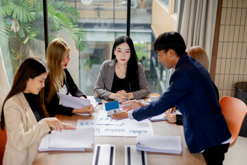 Professional business meeting with colleagues discussing contracts, teamwork, innovation, and cooperation, featuring handshake, communication, diversity, leadership, and success.