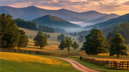 Obraz premium Serene mountain valley at dawn. Fields, trees, and a winding road