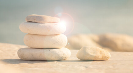 harmony and positive thinking concept. Stack of stable pebble stones. Tranquility, balance of body, mind, soul and spirit. Mental health practice