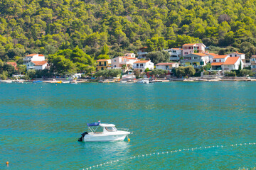 Beautiful seascape. Beach houses with sea view. Blue sea water.