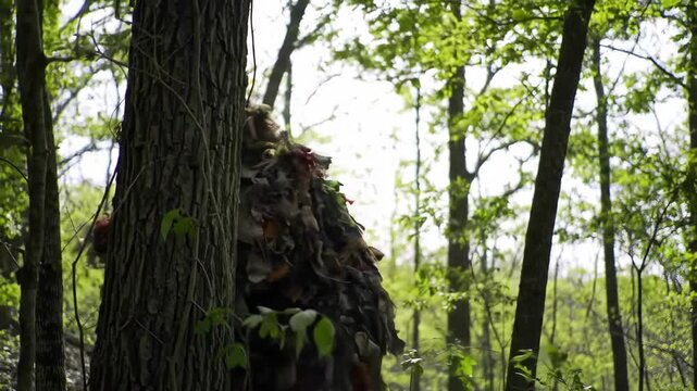 Ghillie Suit in Action Stealth Camouflage in the Forest