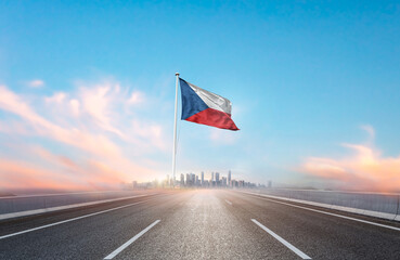 Czech Republic national flag with mast waving with beautiful skyline. A view from highway. Czech flag for Republic Day and Independence Day.
