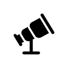 Illustration of a black spotlight on a stand, angled upwards, showcasing a simple and modern design aesthetic