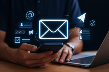 Close Up Of A Person Using A Smartphone To Interact With A Digital Email Interface With A Large Glowing Envelope Icon And Other Related Icons Hovering Above Their Hands