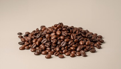 Naklejka premium Pile of Roasted Coffee Beans, Freshly Brewed Aroma, Ready for Grinding, Neutral Background.