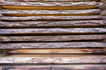 Stapled planks drying outside of at Swiss village of Stammheim on a sunny summer noon. Photo taken August 22nd, 2025, Zurich Unterstammheim, Switzerland.