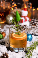 Bourbon Old Fashioned Winter Cocktail. Spicy rosemary syrup mixed with warming bourbon, fresh lemon and orange