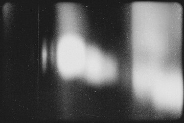 light leak overlay effect with scratch dust and blur light leaks,retro noisy film texture light leak flare on black background,abstract black and white background with red bokeh,grunge film strip 