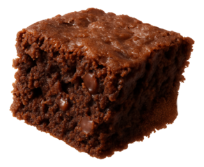 A brownie crumb mid-flight, with a dust of cocoa trailing.