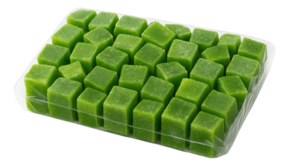 A paper-lined coconut cupcake with a mound of shredded coconut and a maraschino cherry on top.