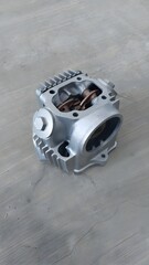 Fototapeta premium Close-up view of a silver-colored engine cylinder head.