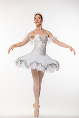Studio portrait of a ballerina in a white tutu