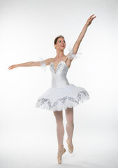 Studio portrait of a ballerina in a white tutu