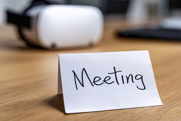 Meeting note card beside vr headset, virtual reality business
