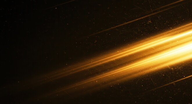 Golden light streaks create a dynamic and abstract background with a sense of speed and motion blur effect