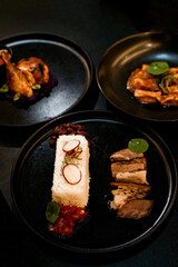grilled fish dish with spiced chicken and rice on a plate on the dining table