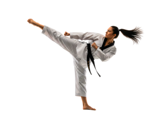 Dynamic Taekwondo: A female athlete demonstrates the power and precision of taekwondo, executing a high kick with skill and focus.
