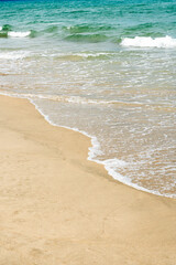 Blue Sea Waves Crashing On Sandy Beach