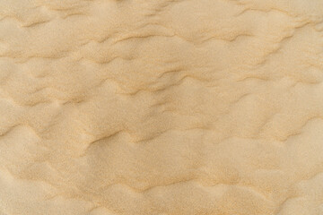 Yellow Wavy Sand Textured Background