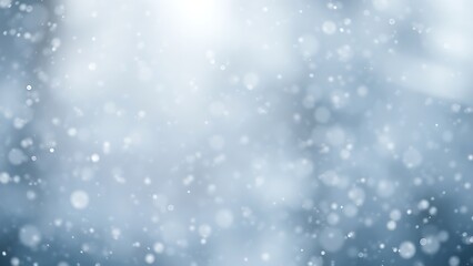 Obraz premium Gentle snowfall in soft illumination, evoking quiet winter mood.