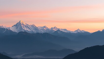 Majestic mountain range at sunrise with soft pink and orange hues over snowy peaks and misty valleys.