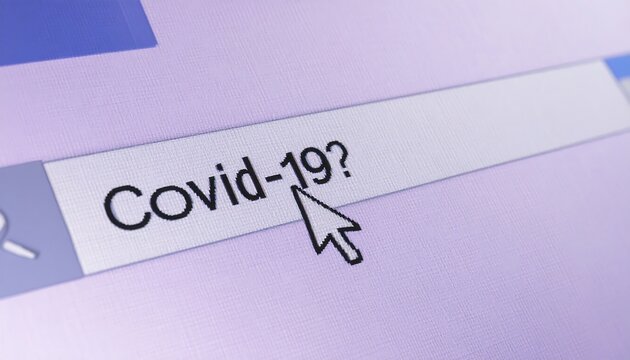 Close-up of a computer screen showing a web search for "Covid-19? - Powered by Adobe