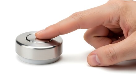 Close-up of a Finger Pressing a Shiny Metallic Button on a White Surface