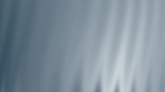 Blurry abstract gray background with vertical stripes, suitable for web design, presentations, backgrounds, or artistic projects enhancing modern aesthetics.