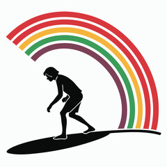 Person surfing under rainbow silhouette