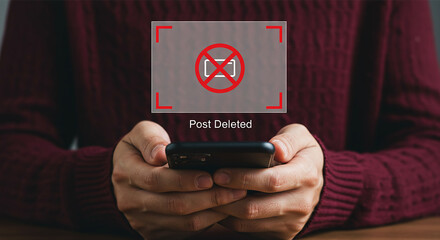 Digital Erasure: A person holds a smartphone, highlighting digital content deletion or privacy concerns in this impactful illustration.