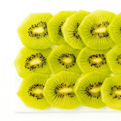 Sliced kiwi arranged on a white plate
