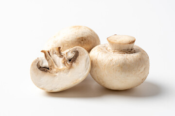 Fresh Organic Champignon Mushrooms on White Background, Healthy Eating Concept