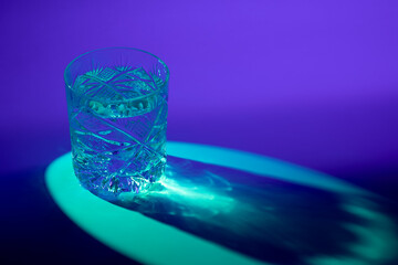 Water Filled Whiskey Glass with Caustic Reflections