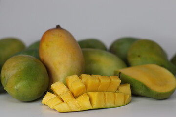 Raseeli mango in hedgehog and halved cuts, South Asian fruit symbolizing freshness and preparation
