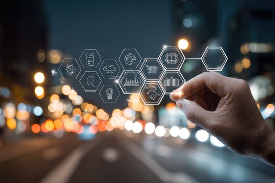 Hand interacting with a digital network of interconnected hexagonal icons representing various data points in a cityscape