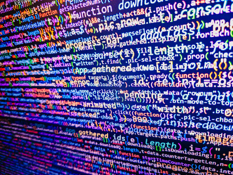 Code of javascript language on white background. Computer script coding source code on desktop monitor. Writing program code on computer