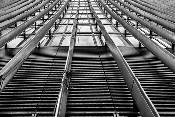 Black and white side view of a tall modern building in the City of London, showcasing urban architecture, financial district skyline, and contemporary cityscape design.