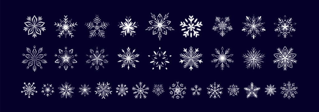 Set of white chalk snow flake drawings of dark blue blackboard. Childish crayon, pencil, pastel whimsical scribbles. Winter Merry Christmas and Happy New Year design elements. Fancy ice frozen symbols