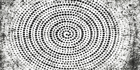 Abstract halftone pattern of light dots on a black and white background